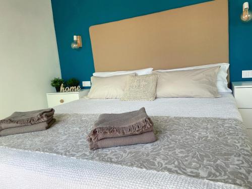 A bed or beds in a room at ZajaraHome