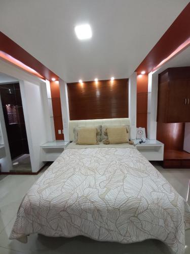 a bedroom with a large bed in a room at La Aurora Hotel Like Home in Huamantla