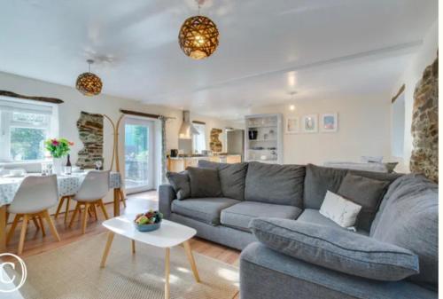 Posezení v ubytování The Barn at Well Cottage