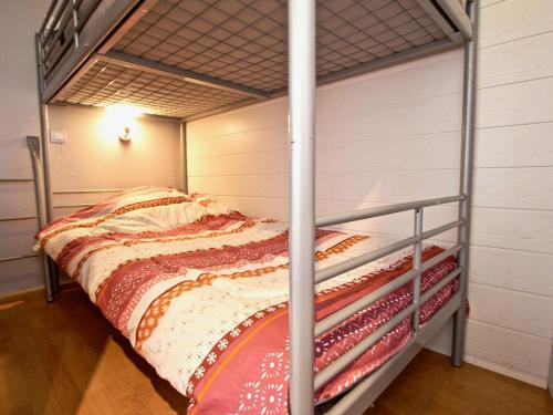 Ένα ή περισσότερα κρεβάτια σε δωμάτιο στο Studio Chamrousse, 1 pièce, 4 personnes - FR-1-340-195