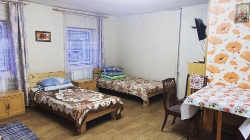 Кровать или кровати в номере Ирина