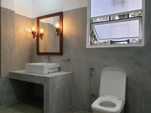 Kamar mandi di Olee Villa