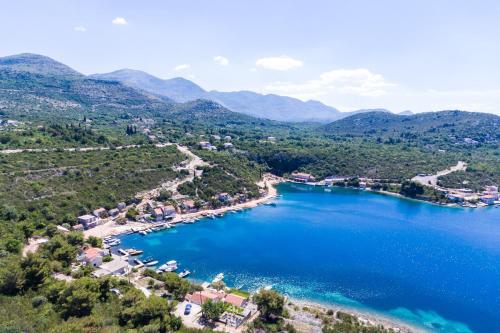 an aerial view of a small island in a lake at Holiday Home Magazin in Slano
