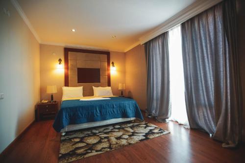 Postel nebo postele na pokoji v ubytování Hotel Park Green