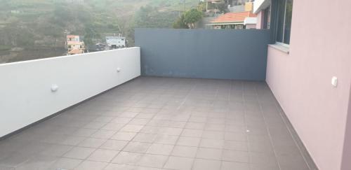 Een balkon of terras bij D Henriques House