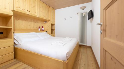 Tempat tidur dalam kamar di Italianway - San Nicolò 64