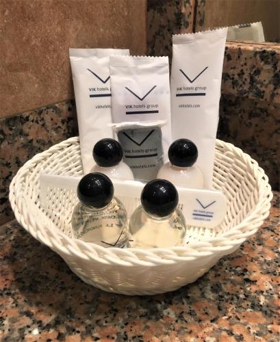 a basket of complimentary bathroom products on a counter at VIK Hotel San Antonio in Puerto del Carmen