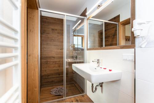 Koupelna v ubytování Landhotel Hinteraigengut