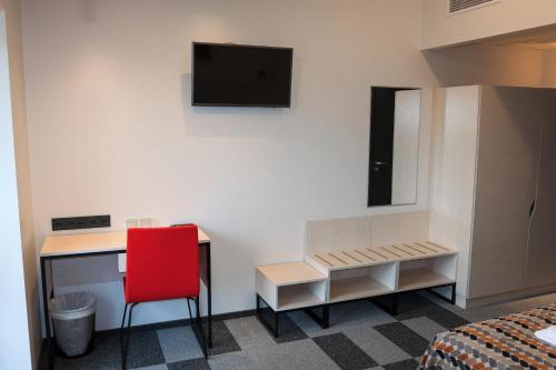 TV a/nebo společenská místnost v ubytování Kääriku Hotel