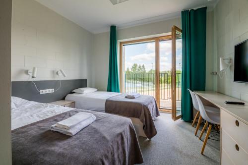 מיטה או מיטות בחדר ב-Kääriku Hostel
