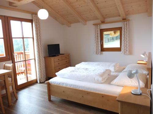 Postel nebo postele na pokoji v ubytování Haus Schlernblick
