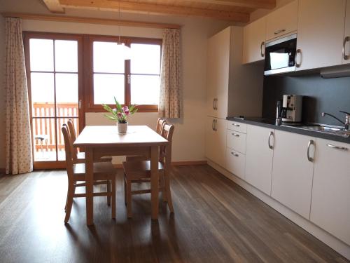 Kuchyň nebo kuchyňský kout v ubytování Haus Schlernblick