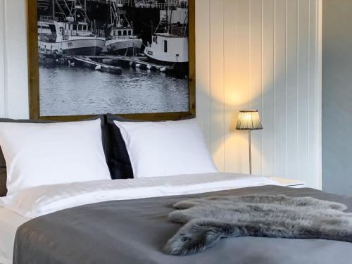 Cama o camas de una habitación en Båtsfjord Brygge - Arctic Resort