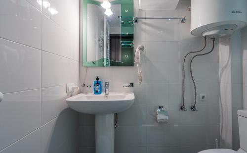 Koupelna v ubytování 2-room Apartment NFT Gudauri 303