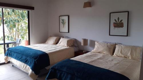 Ένα ή περισσότερα κρεβάτια σε δωμάτιο στο Hotel Suamena