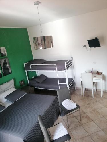 Postel nebo postele na pokoji v ubytování B&b Cilento Paestum