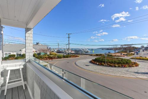 a balcony with a view of a street at Harbourtown Suites on Plymouth Harbor in Plymouth