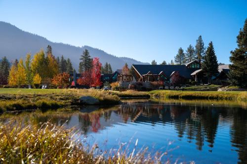 a house with a pond in front of it at Edgewood Tahoe Resort in Stateline
