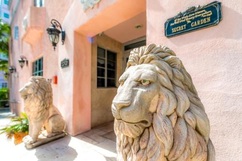 a statue of a lion outside of a building at Secret Garden Miami Beach in Miami Beach