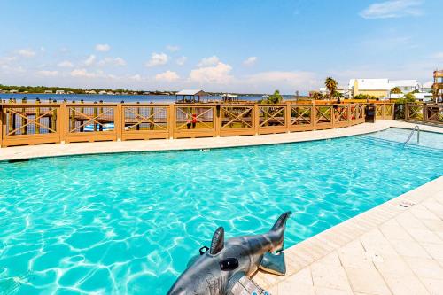 a statue of an elephant in a swimming pool at Cool Breeze in Gulf Shores