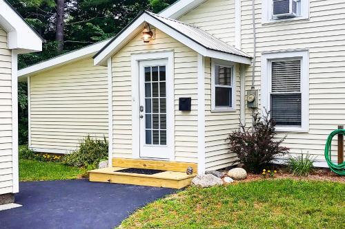 a house with a bench in front of it at Warrensburg Home about 6 Mi to Lake George! in Warrensburg