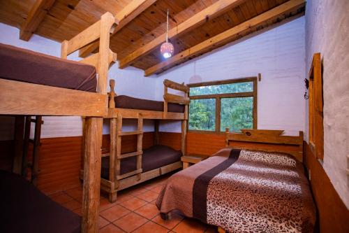 Postel nebo postele na pokoji v ubytování Cabañas RuizSeñor