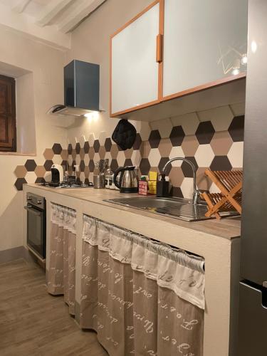 A kitchen or kitchenette at Pienzalettings