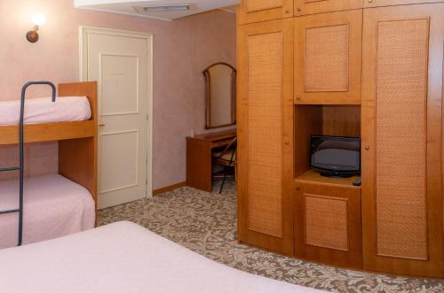 Krevet ili kreveti na kat u jedinici u objektu Hotel Terrazzo d'Abruzzo