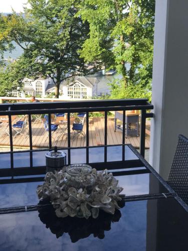 a view of a balcony with a bowl on a table at Viktoria Deluxe direkter Meerblick in Ostseebad Sellin