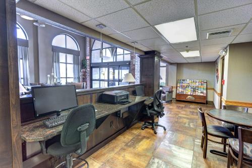 an office with a desk with a computer and chairs at Best Western Music Capital Inn in Branson