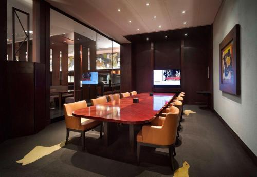 a conference room with a wooden table and chairs at Grand Hyatt Seoul in Seoul