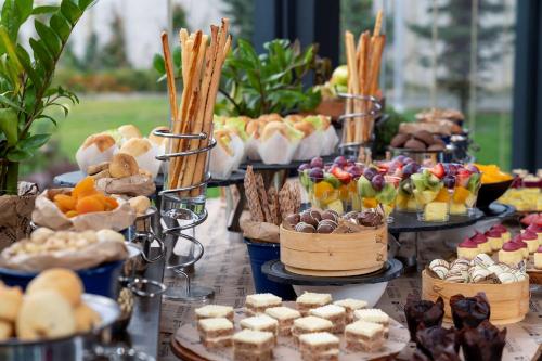 a buffet of desserts and pastries on a table at Radisson Blu Hotel Istanbul Asia in Istanbul