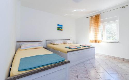 Postel nebo postele na pokoji v ubytování Apartment Lea