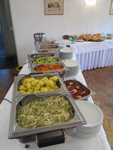 a buffet line with many different types of food at Hotel Am Sonnenhang in Kassel
