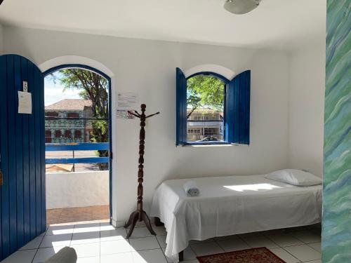 En eller flere senge i et værelse på Pousada Ruínas do Pilar