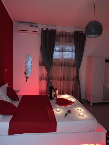 a bedroom with a bed with lights on it at B&B Magma in Ercolano