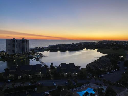 an aerial view of a harbor at sunset at 122 Seascape Dr Unit 1406 in Destin