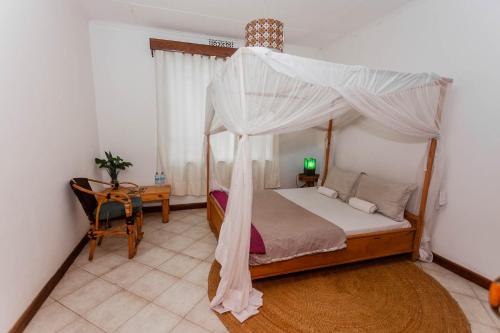 Ένα ή περισσότερα κρεβάτια σε δωμάτιο στο Villa Poa
