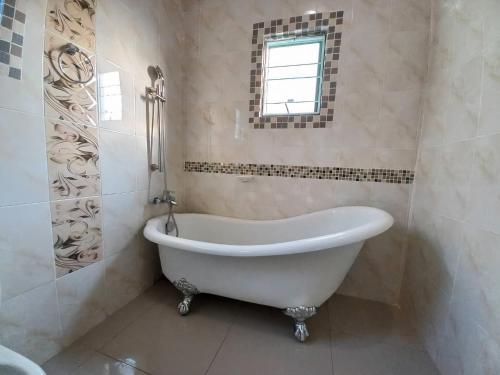 A bathroom at Shalakwe Hills-Inn B&B Kasane
