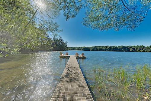 a group of people on boats on a lake at Newcastle Lake House in Newcastle
