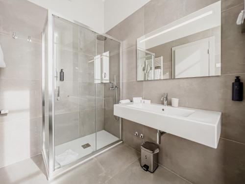 a bathroom with a sink and a shower at Grand Hotel San Gemini I UNA Esperienze in San Gemini