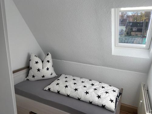 Postel nebo postele na pokoji v ubytování Gästehaus Graupner-Mittweida