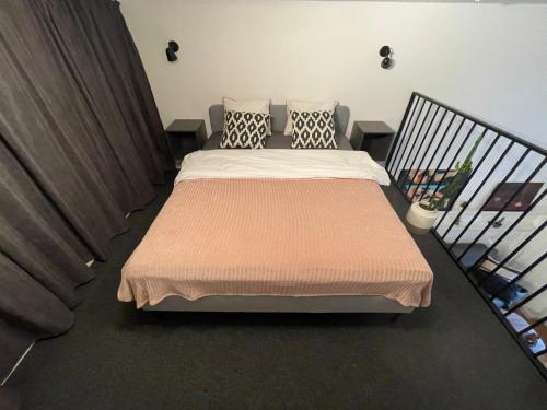 מיטה או מיטות בחדר ב-M Loft
