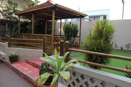 Jardín al aire libre en Sikamifer Tourist Resort