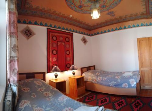 Ένα ή περισσότερα κρεβάτια σε δωμάτιο στο Meros B&B