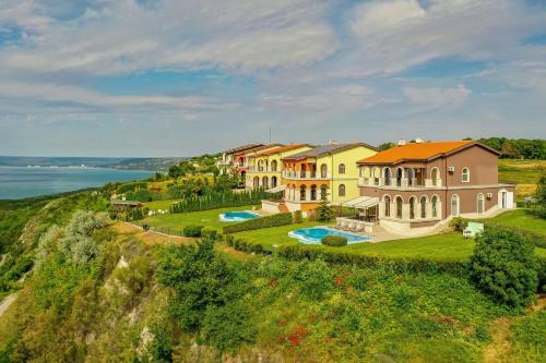 an aerial view of a house on a hill at Lighthouse Luxe Estate Apart & Villas in Balchik