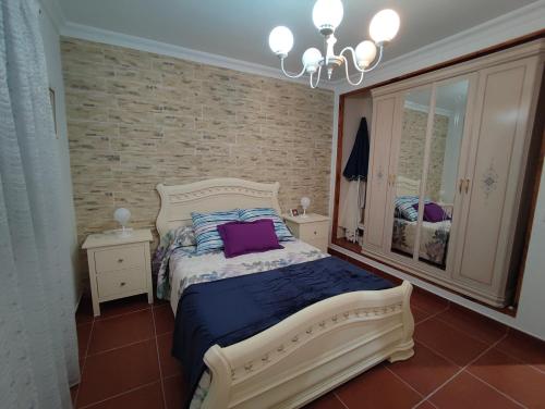 Llit o llits en una habitació de Villa Rosa