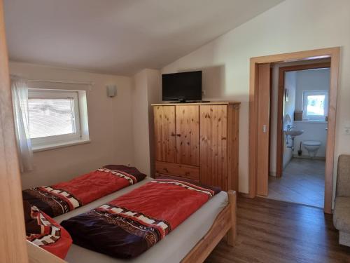 Postel nebo postele na pokoji v ubytování Das Taubenhaus