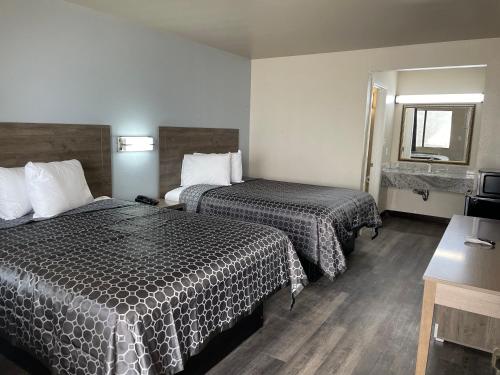 Katil atau katil-katil dalam bilik di Masters Inn Atlanta - Doraville at I-85 & 285