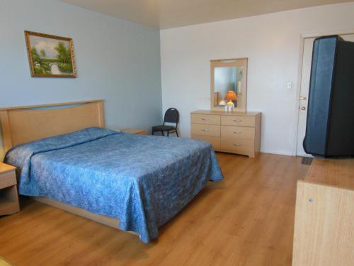 Postel nebo postele na pokoji v ubytování Motel Pierre